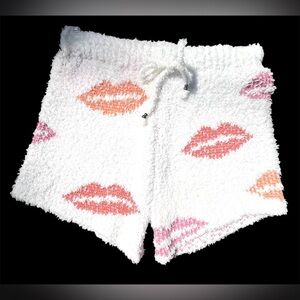POL white fuzzy knit lounge shorts with lip prints and a drawstring waistband